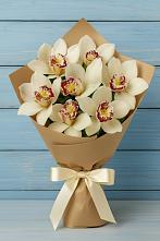 Букет 7 белых орхидей в Суворовское Крым Букет цветов из:  Орхидеи и Розы в Суворовское Крым